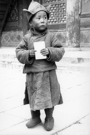 His His Holiness the Dalai Lama at the age of four at Kumbum Monastery in Amdo, Eastern Tibet.